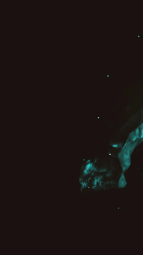 Colorful light patterns in dark space suggest movement of cosmic matter Stock Footage 337974712