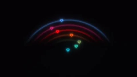 Colorful light patterns form arcs with glowing hearts in Stock Footage 338229261