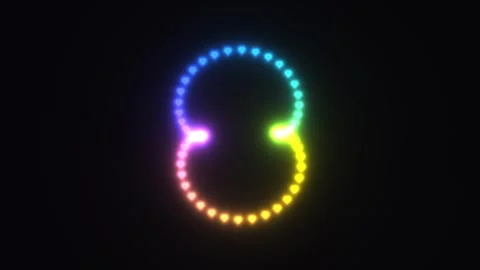 Colorful light patterns form a circular shape in dark Stock Footage 338286999