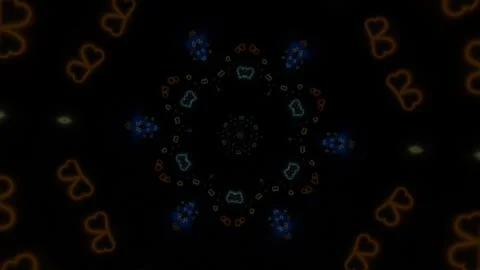 Colorful light shapes create a spinning pattern on a dark Stock Footage 338065753