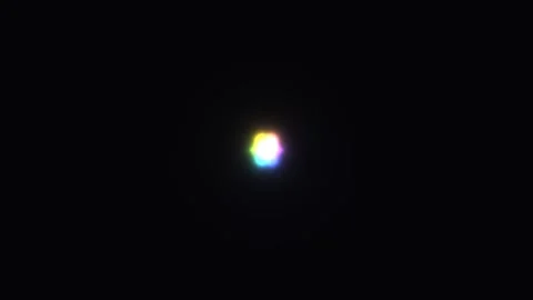Colorful light source appears in dark background Stock Footage 338230515