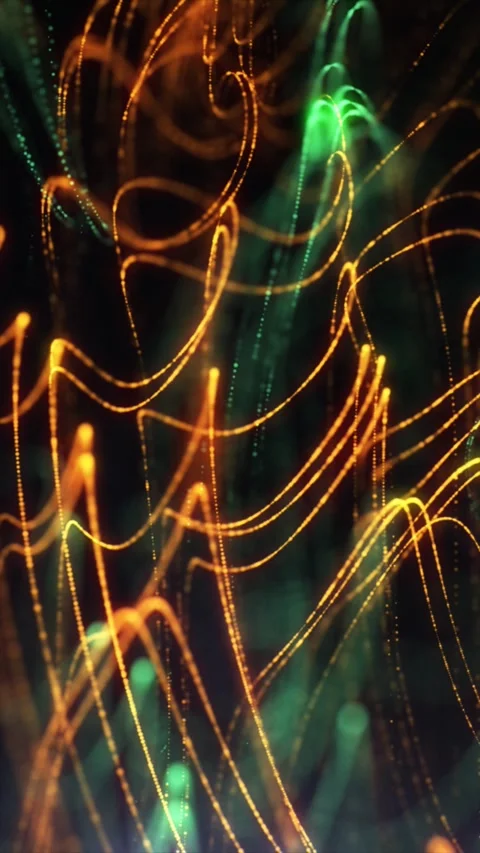 Colorful light trails form mesmerizing patterns at night Stock Footage 312799034