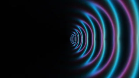 Colorful light waves create patterns in a dark tunnel Stock Footage 338226408