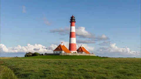 Colorful lighthouse at Westerhever, Germany Stock Footage 83662322