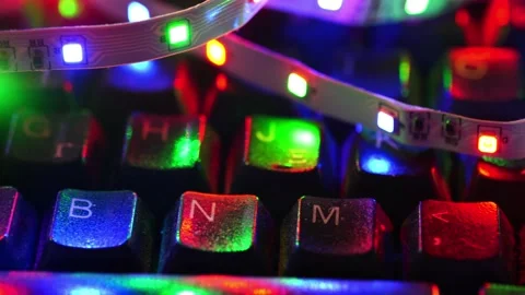 Colorful lights on the computer keyboard 4k Stock Footage 165299168