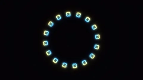 Colorful lights create a circular pattern against a dark Stock Footage 338227540