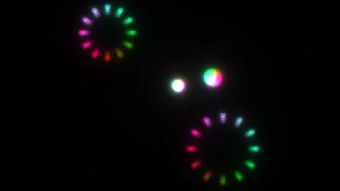 Colorful lights create patterns in dark background Stock Footage 338208217