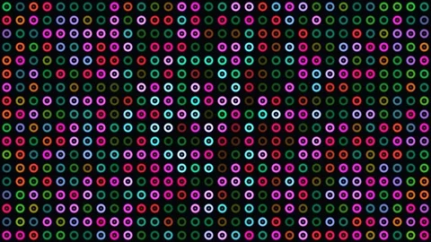 Colorful lights create a vibrant pattern on a dark Stock Footage 338199180