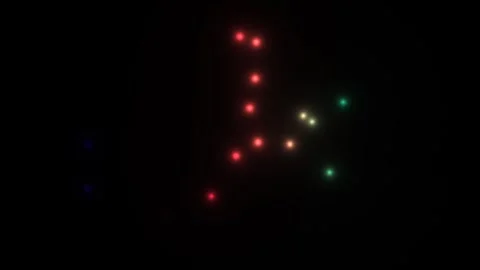 Colorful lights creating patterns against a dark background Stock Footage 338182087