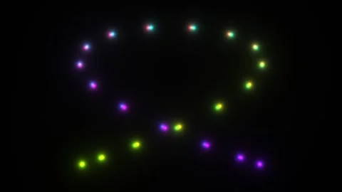 Colorful lights form a pattern in dark space Stock Footage 338404006