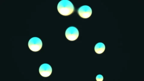 Colorful lights move in a pattern against a dark background Stock Footage 338236746