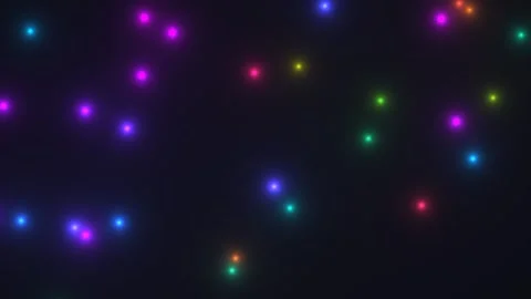 Colorful lights shine in a dark background creating a Stock Footage 338005496