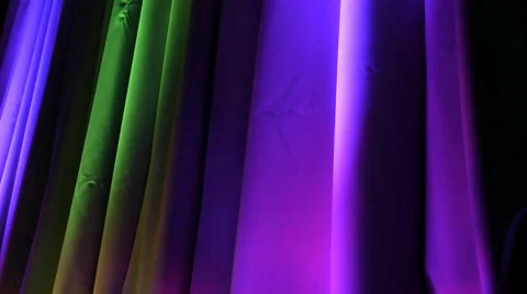 Colorful lights strobing on curtains Video stock 35190840