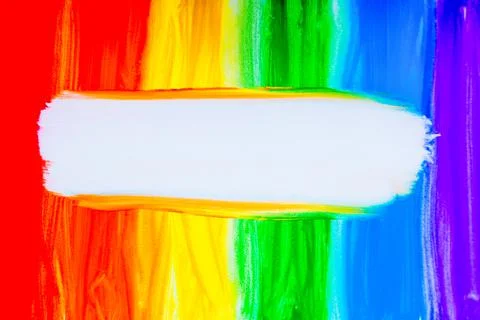Colorful lines drawn vertically with paint in the form of a rainbow with a white Stock Photos