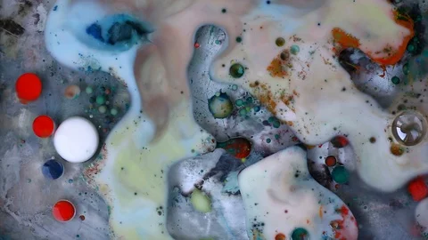 Colorful liquid bubbles spreading. Inks is mixed video. Stock Footage 123777995