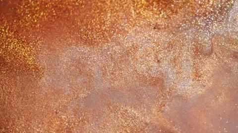 Colorful liquid paint abstract background. Acrylic paints with golden glitter Stock Footage 278650580