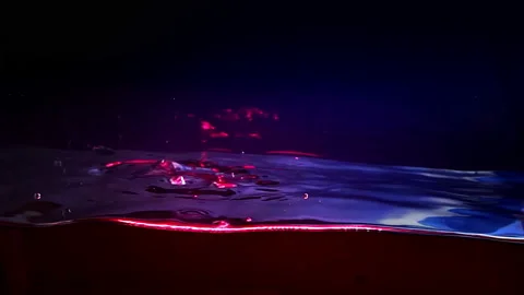 Colorful Liquid Surface spalshing, Night Sky Reflecting In the Water Stock Footage 95534212