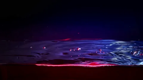 Colorful Liquid Surface Wave close up.  Night Sky Reflecting In the Water, Vidéo 95534174