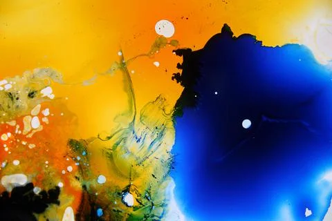 Colorful liquids mixed together to an abstract painting Stock Photos