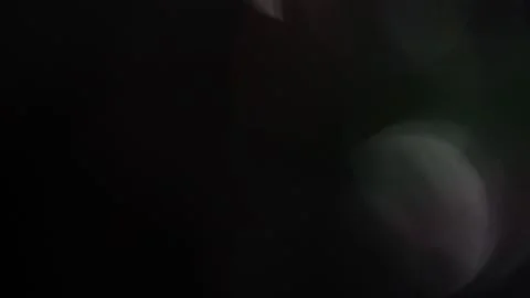 Colorful low and high light bokeh on the right in the dark Vidéo 318730153