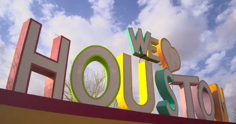 Colorful Low Angle Shot of Iconic 'We Love Houston' Sign Stock Footage 303690164