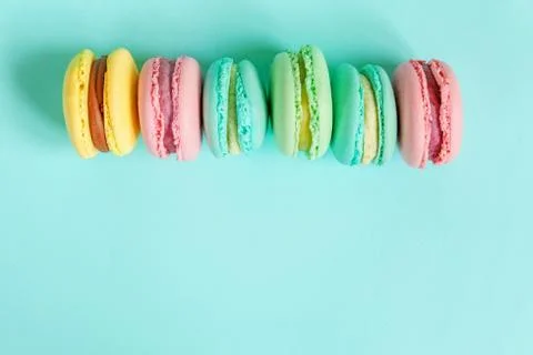 Colorful macaron on blue background Stock-Fotos