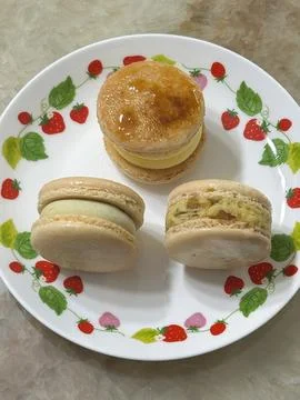 Colorful macarons with a delicate, crispy shell and soft, flavorful filling.. Stock Photos