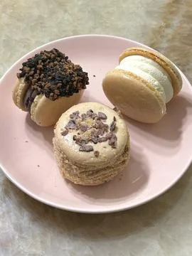 Colorful macarons with a delicate, crispy shell and soft, flavorful filling.. Stock Photos