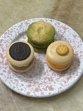 Colorful macarons with a delicate, crispy shell and soft, flavorful filling.. Stock Photos