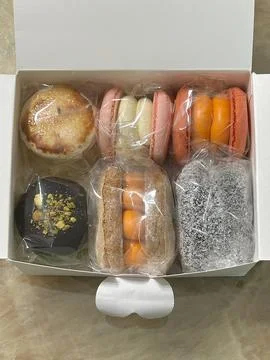 Colorful macarons with a delicate, crispy shell and soft, flavorful filling.. Stock Photos