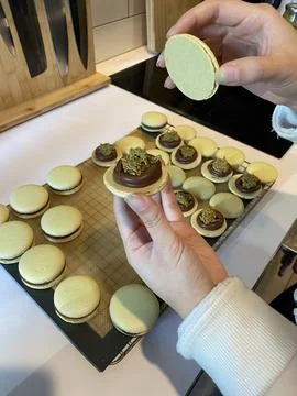 Colorful macarons with a delicate, crispy shell and soft, flavorful filling.. Stock Photos
