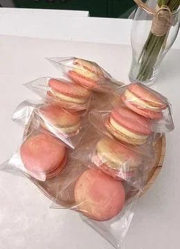 Colorful macarons with a delicate, crispy shell and soft, flavorful filling.. Stock Photos