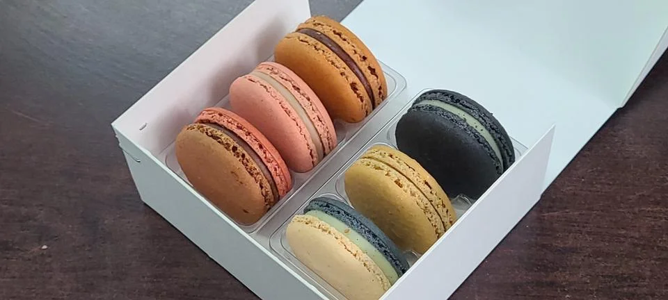 Colorful macarons with a delicate, crispy shell and soft, flavorful filling.. Stock Photos