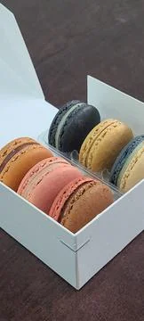 Colorful macarons with a delicate, crispy shell and soft, flavorful filling.. Stock Photos