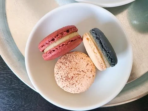 Colorful macarons with a delicate, crispy shell and soft, flavorful filling.. Stock Photos