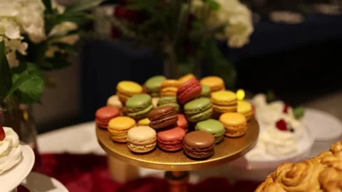 Colorful macarons on dessert stand Stock Footage 337589457