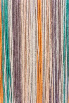 Colorful macrame threads texture closeup Stock Photos