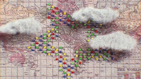 Colorful map pins forming patterns under fluffy clouds Stock Footage 346778219