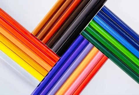 Colorful markers arranged in a rainbow pattern Stock Photos