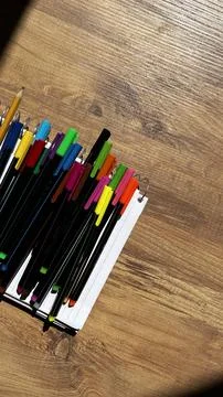 Colorful Markers on Notebook Stock Photos