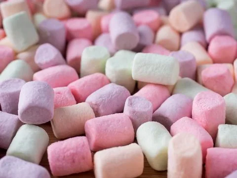 Colorful marshmallows candy for background uses. Textured background. Stock Photos