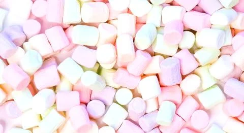 Colorful marshmallows on a white table. close up Stock Photos