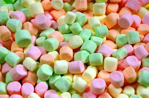 Colorful miniature marshmallows Stock Photos