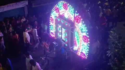 Colorful Moving Light Panel and Crowd at Night Street Festival, India Vídeos de archivo 334592035