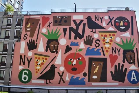 A colorful mural of faces and objects with the letters NY written in the middle, Stock-Fotos