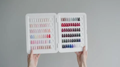 Colorful Nail Polish Samples in Display Case for Manicure and Pedicure Choices Video stock 315434946