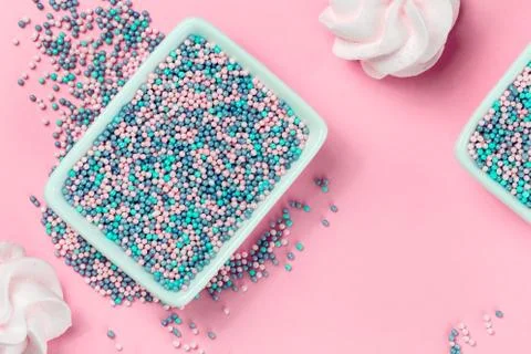 Colorful nonpareils cake sprinkles in rectangular bowls Stock Photos