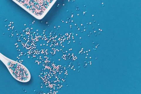 Colorful nonpareils cake sprinkles in rectangular bowls Stock Photos