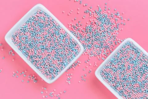 Colorful nonpareils cake sprinkles in rectangular bowls Stock Photos