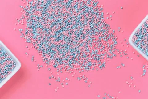 Colorful nonpareils cake sprinkles in rectangular bowls Stock Photos